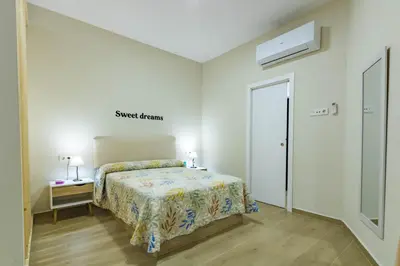 Cama o camas de una habitación en Esencia de Cordoba. Loft Deluxe