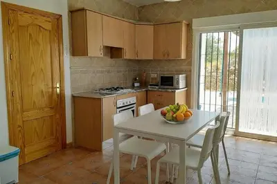 Una cocina o zona de cocina en Casa del Aguila