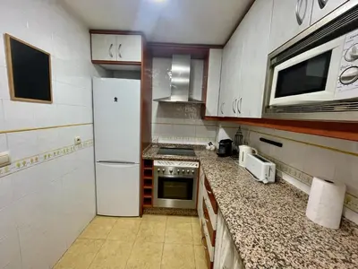 Una cocina o zona de cocina en Geysotur Duplex Balcon del Rio