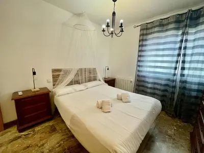 Cama o camas de una habitación en Geysotur Duplex Balcon del Rio