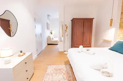 Cama o camas de una habitación en Pickman Suites