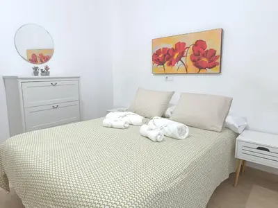 Cama o camas de una habitación en HOME CENTRO I max 4 personas HOME CENTRO II max 6 personas
