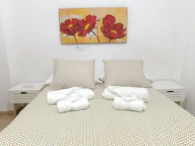 Cama o camas de una habitación en HOME CENTRO I max 4 personas HOME CENTRO II max 6 personas