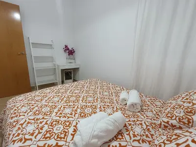 Cama o camas de una habitación en HOME CENTRO I max 4 personas HOME CENTRO II max 6 personas