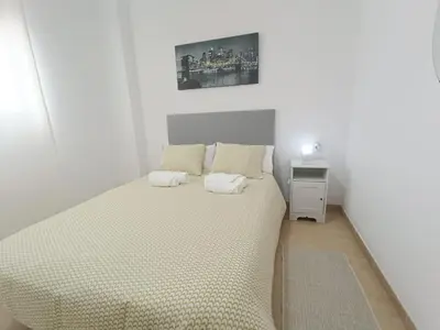 Cama o camas de una habitación en HOME CENTRO I max 4 personas HOME CENTRO II max 6 personas