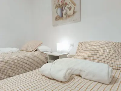 Cama o camas de una habitación en HOME CENTRO I max 4 personas HOME CENTRO II max 6 personas