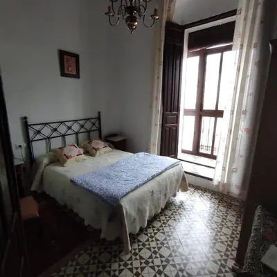 Cama o camas de una habitación en Mesones Casa Rural