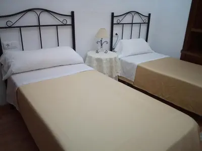 Cama o camas de una habitación en Mesones Casa Rural