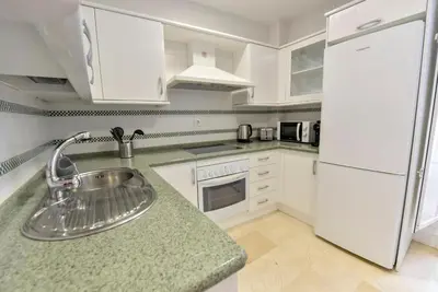 Una cocina o zona de cocina en New! Exclusive Duplex Design | Parking & Pool