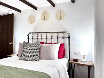 Cama o camas de una habitación en Casa rural con Starlink a 30 min de Málaga