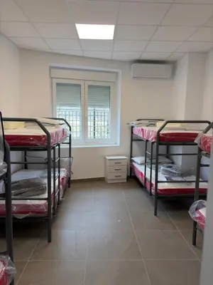 Cama o camas de una habitación en Albergue Rural Badolatosa