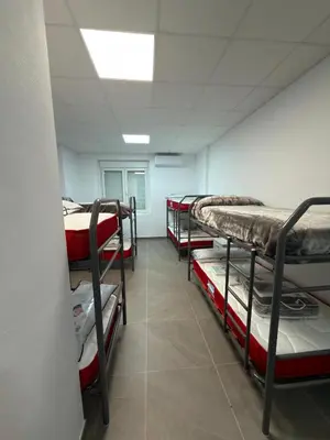 Cama o camas de una habitación en Albergue Rural Badolatosa