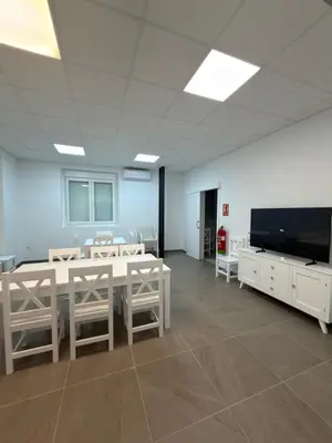 Una televisión o centro de entretenimiento en Albergue Rural Badolatosa