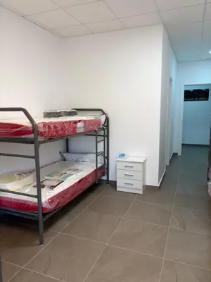 Cama o camas de una habitación en Albergue Rural Badolatosa