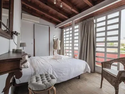 Cama o camas de una habitación en San Leandro ático