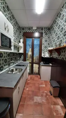 Una cocina o zona de cocina en APARTAMENTO La CAVA