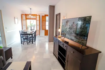 Una televisión o centro de entretenimiento en Wallada Patio Andalusí