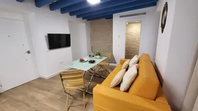 Una televisión o centro de entretenimiento en Hogarium Plaza de San Pedro
