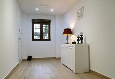 Una cocina o zona de cocina en Suites TDJ Centro