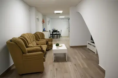 Zona de estar de Suites TDJ Centro