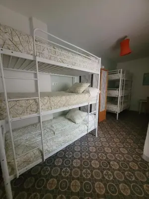 Cama o camas de una habitación en Hospejade cerca de la feria