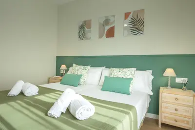 Cama o camas de una habitación en Bustos Tavera Central Suite