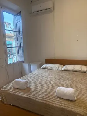Cama o camas de una habitación en Balcón Andaluz