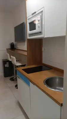 Una cocina o zona de cocina en Apartamento Acogedor