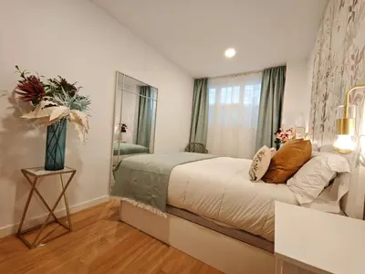 Cama o camas de una habitación en Cavestany Suites