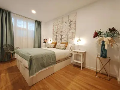 Cama o camas de una habitación en Cavestany Suites