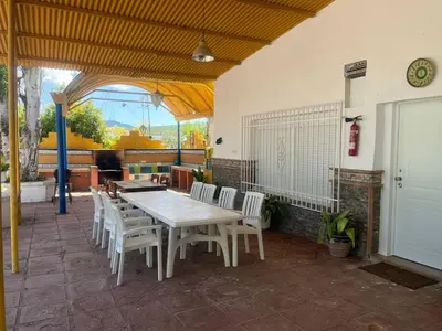 Un balcón o terraza de Casa para Grupos en Lucena Piscina Privada y Barbacoa 14 personas