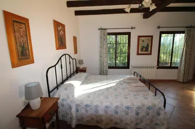 Cama o camas de una habitación en Loma la Parra