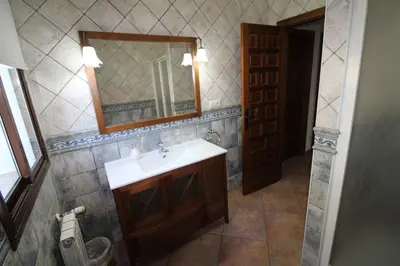 Un baño de Loma la Parra