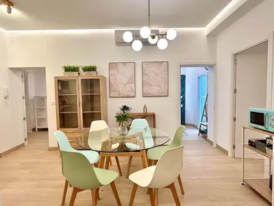 Zona de estar de Acogedor apt 6pax 3Bdr 2Bth - CozyHomeSevilla10