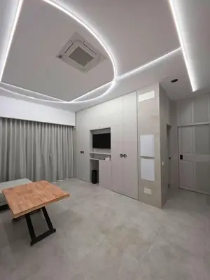 Una televisión o centro de entretenimiento en Lux Apartamento