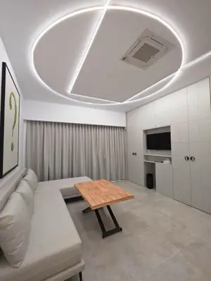 Una televisión o centro de entretenimiento en Lux Apartamento