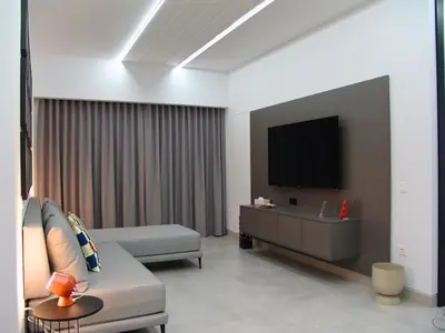 Una televisión o centro de entretenimiento en Geo Apartamento