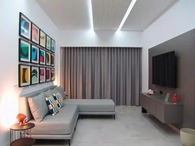 Una televisión o centro de entretenimiento en Geo Apartamento