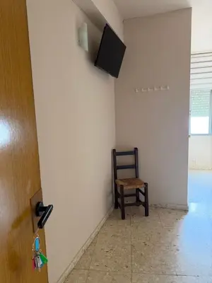 Una televisión o centro de entretenimiento en Hostal Alcántara