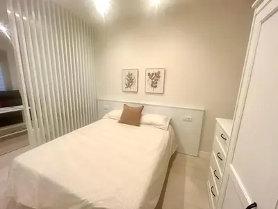 Cama o camas de una habitación en Apartamentos Almogavares Las Rosas