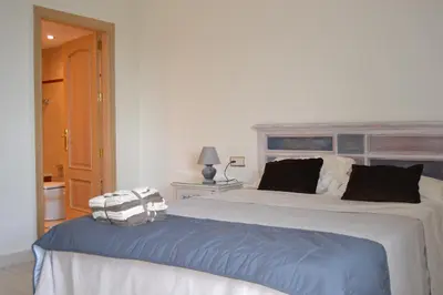 Cama o camas de una habitación en Centro Excelente situación Ático lujo con parking gratuito