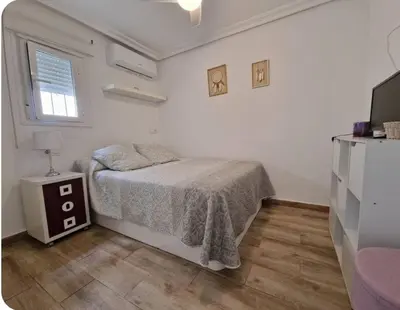 Cama o camas de una habitación en Modern Refuge in Nervión, Wi-Fi and AC Saramago III