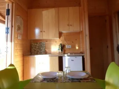 Una cocina o zona de cocina en Bungalow confortable avec terrasse - API-1-52-1827
