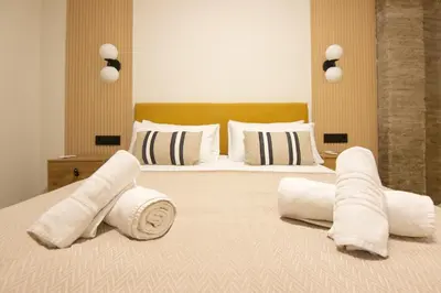Cama o camas de una habitación en RentalSevilla Doña María Coronel