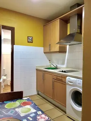 Una cocina o zona de cocina en Atico Terraza Privada