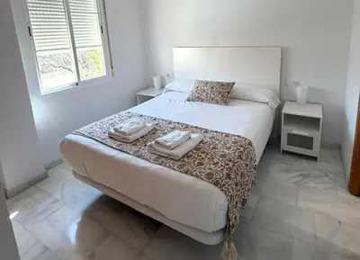 Cama o camas de una habitación en Wallada Brillante