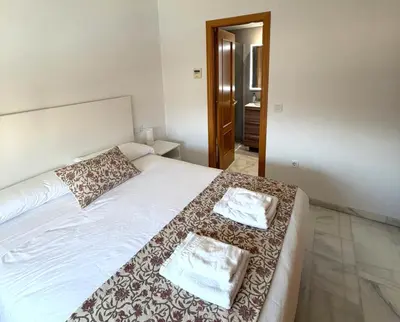 Cama o camas de una habitación en Wallada Brillante