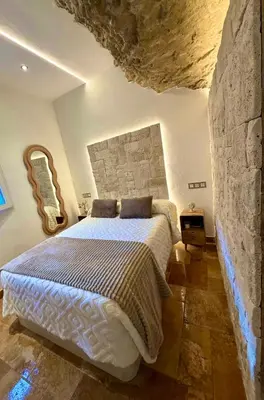 Cama o camas de una habitación en Casa Cueva Transmina 10