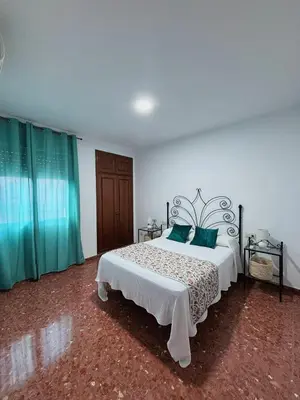 Cama o camas de una habitación en Alojamiento rural El Membrillo