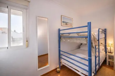 Cama o camas de una habitación en Las Setas en el corazón de Sevilla
